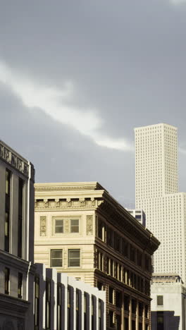 modern skyscrapers rise above historic buildings in urban landscape