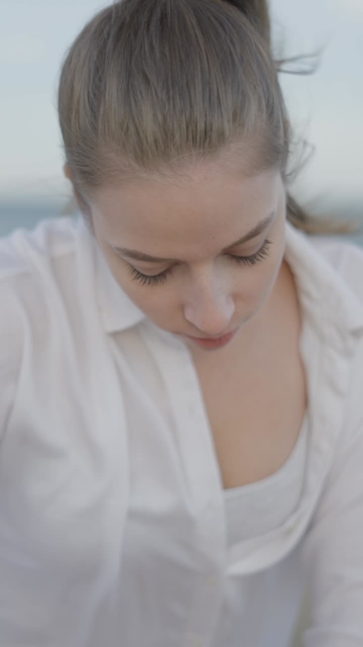 Woman Receiving a Relaxing Back Massage in a Serene Outdoor Setting