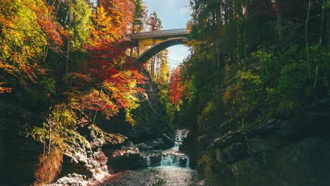 4k uhd cinemagraph - seamless video loop of a mountain river bridge canyon in the bavarian -german alps, close to the austrian border in autumn