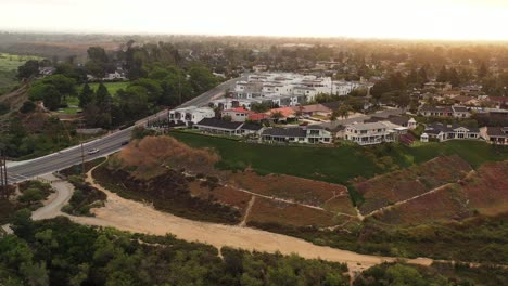rotating parallax 4k aerial drone view of multi million dollar houses overlooking the waterfront
