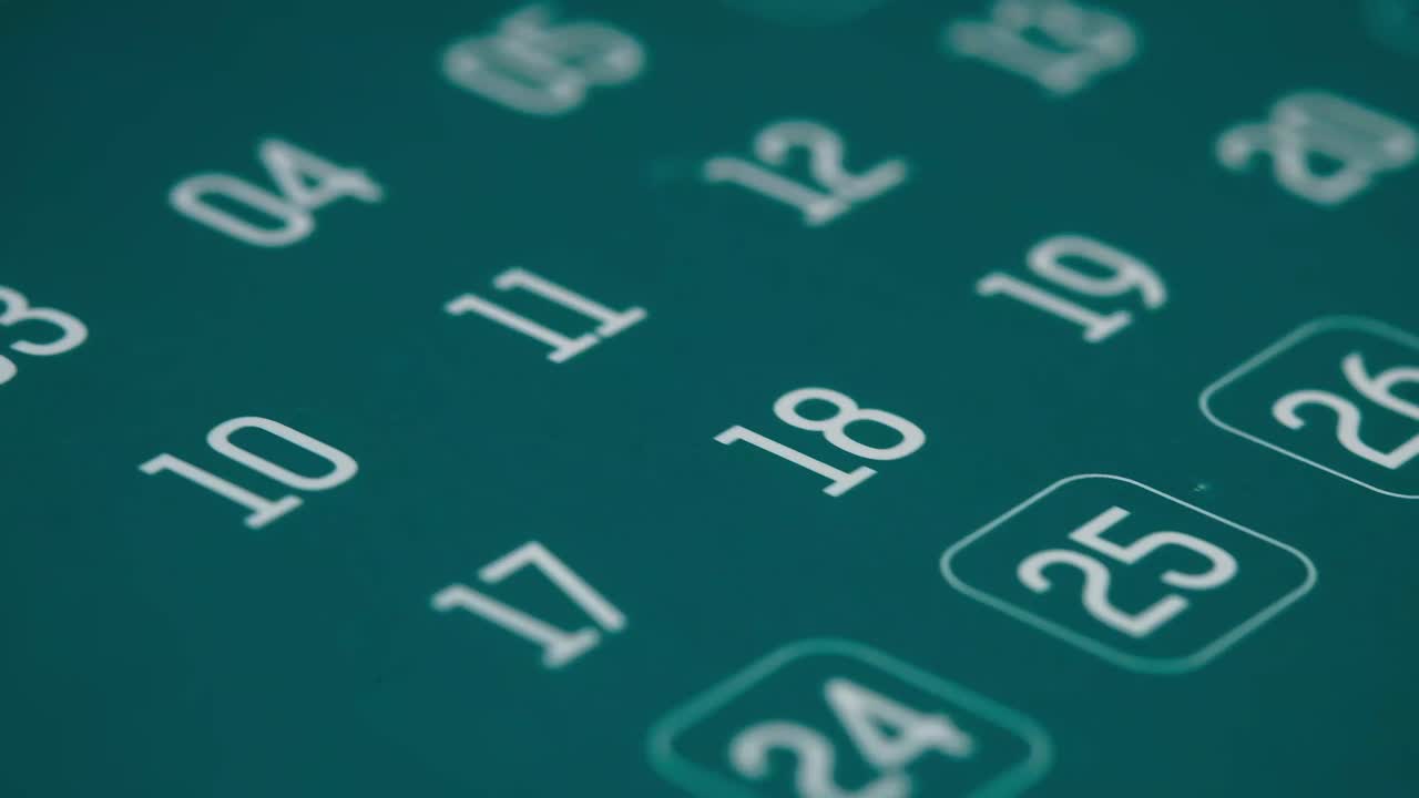 Close-up of a teal calendar