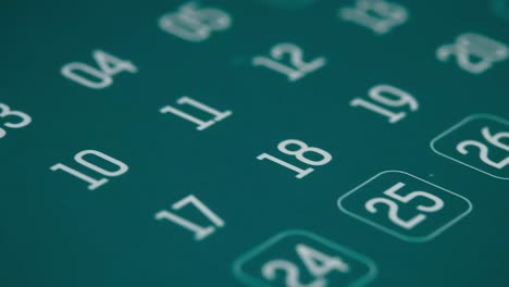 close-up of a teal calendar