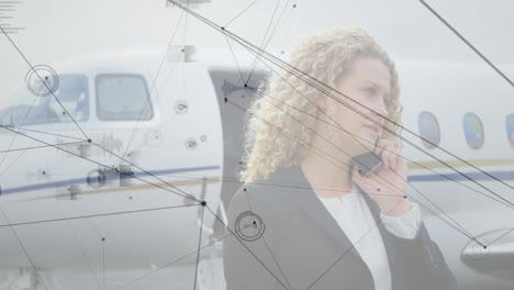 talking on phone near airplane, businesswoman with network connections and data processing animation