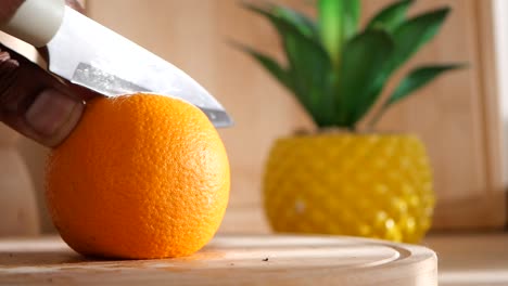 cutting an orange