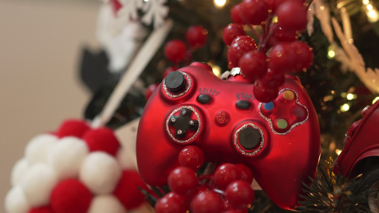 Festive Gaming Controller Ornament on Christmas Tree - Close-Up Shot. 4k.