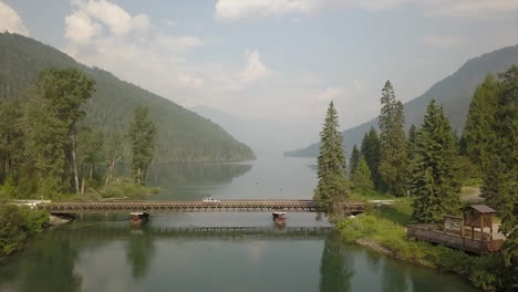 creative cinemagraph of car on mountain bridge, only the shadow moves