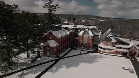 exterior view of bishop's university mcgreer hall during winter in lennoxville, sherbrooke, quebec