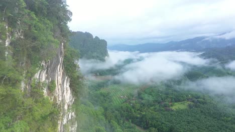 misty green mountains are seen in thailand 1