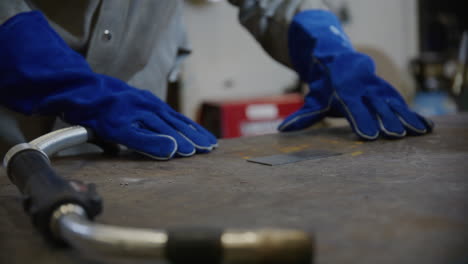 Welding-tools-and-gloves-in-the-shop