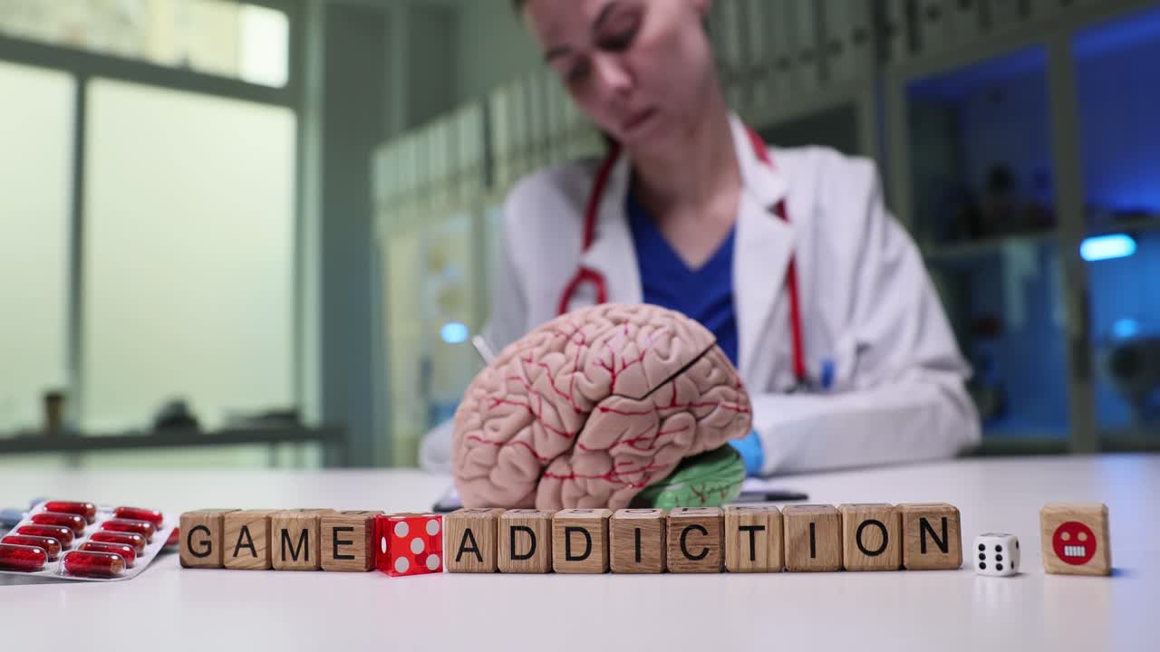 Game Addiction Concept with Brain Model and Medical Professional