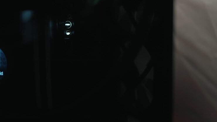 Close-up of a PC build with RGB lighting and components.