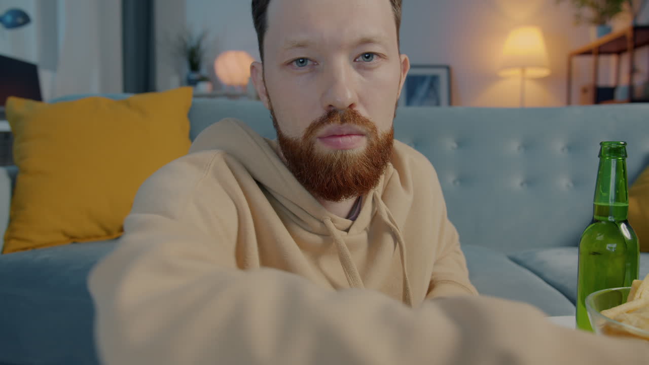 Man Watching TV at Home