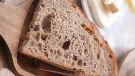 slices of homemade bread on wooden board
