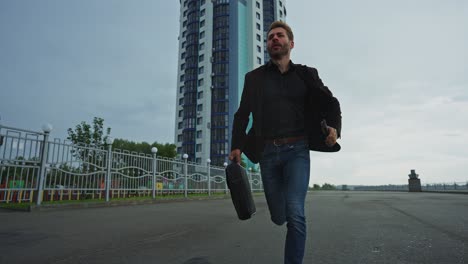 businessman running late in city