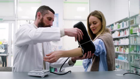 Pharmacist-checking-blood-pressure