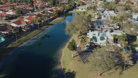 aerial view over water of a community