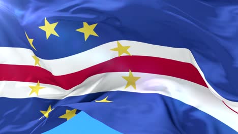 cape verdean flag waving at wind in slow with blue sky, loop