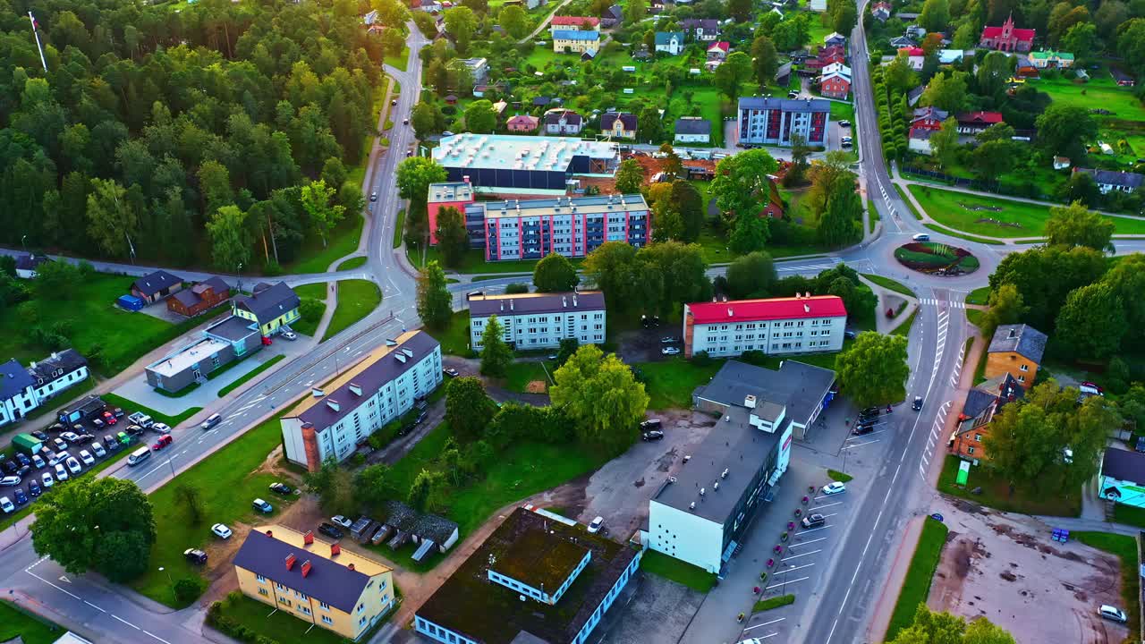New retail store construction with apartments and forest in suburban Smiltene, Latvia