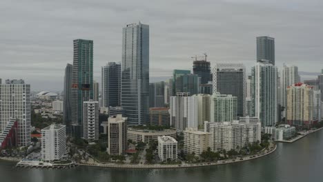 aerial push heading towards buildings in downtown miami