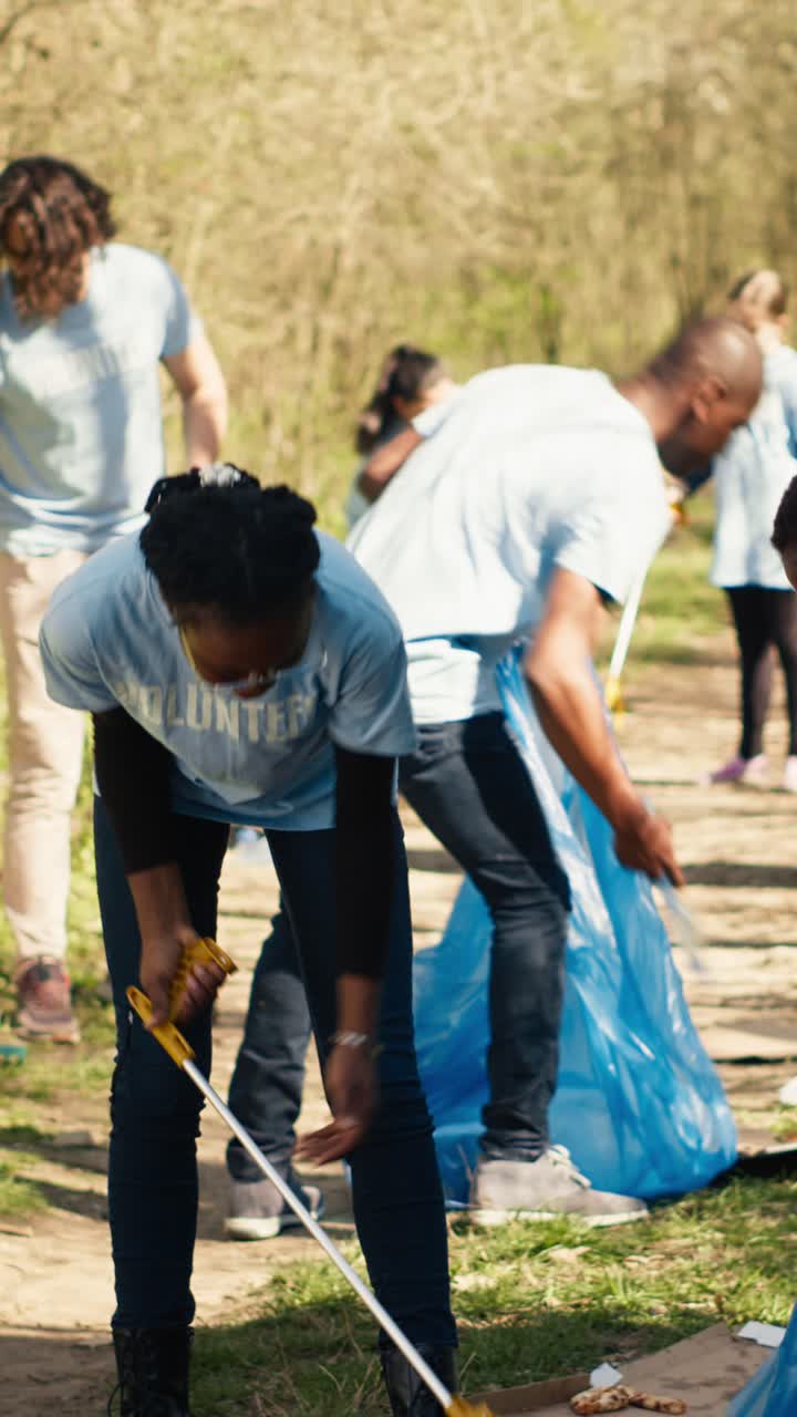 Group of Volunteers Cleaning Up Litter in a Park