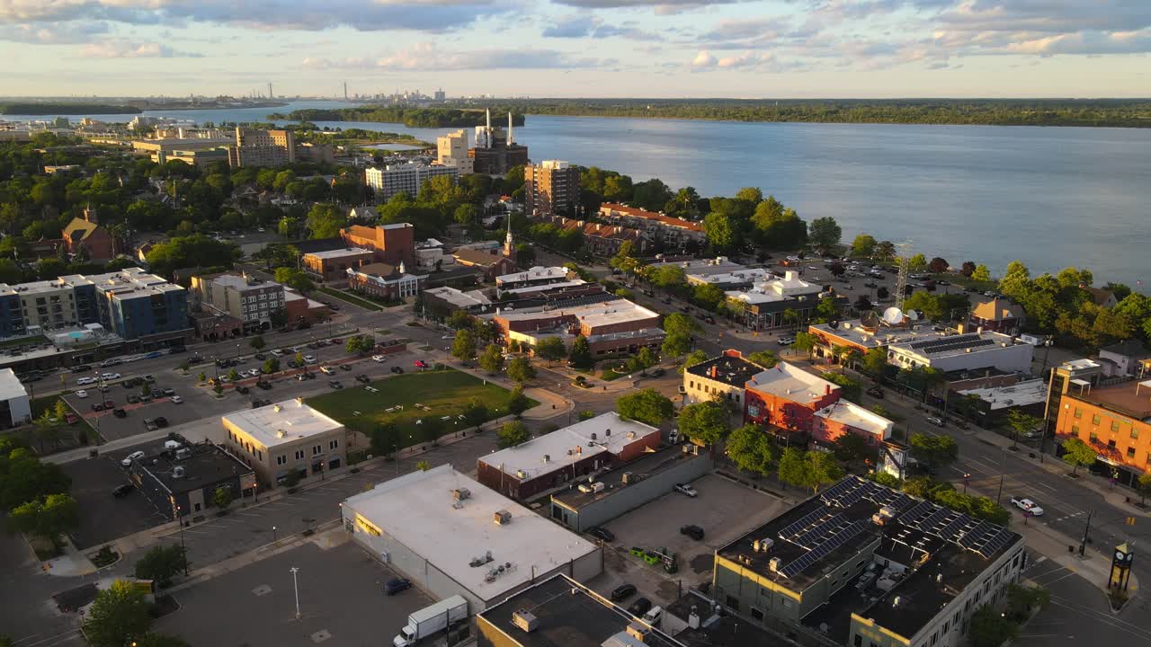 Downtown Wyandotte Michigan with Detroit skyline in background on sunny summer evening, USA