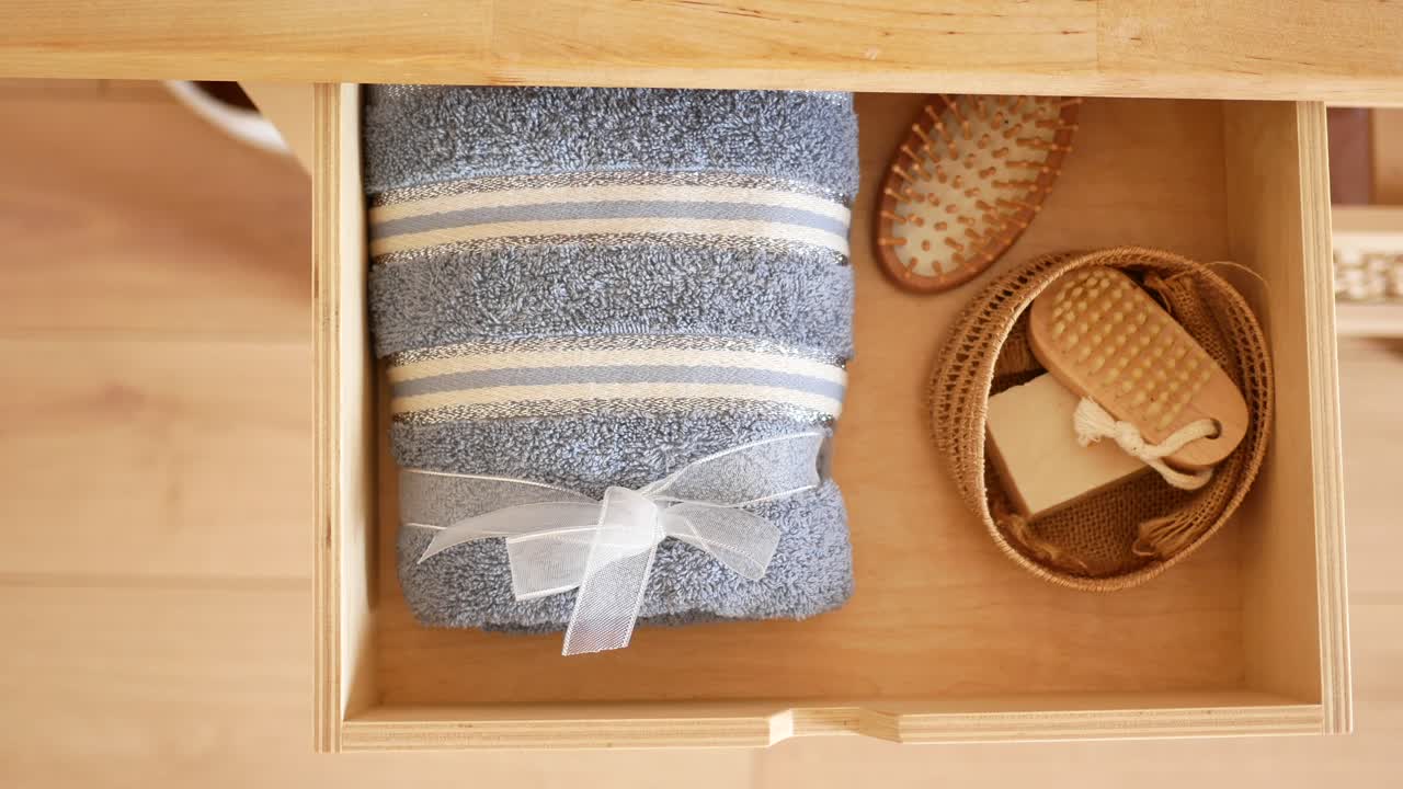 Organized Bathroom Drawer with Towels and Accessories