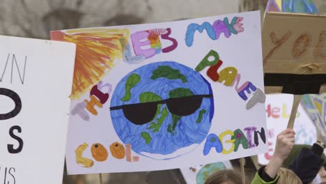 lets make the planet cool again protest sign