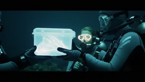 underwater exploration: divers discover a bioluminescent organism in an acryllic container, unveiling the mysteries of the ocean's depths and its fascinating lifeforms