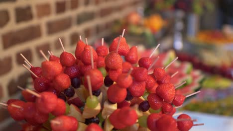 different fresh fruits on wedding buffet table