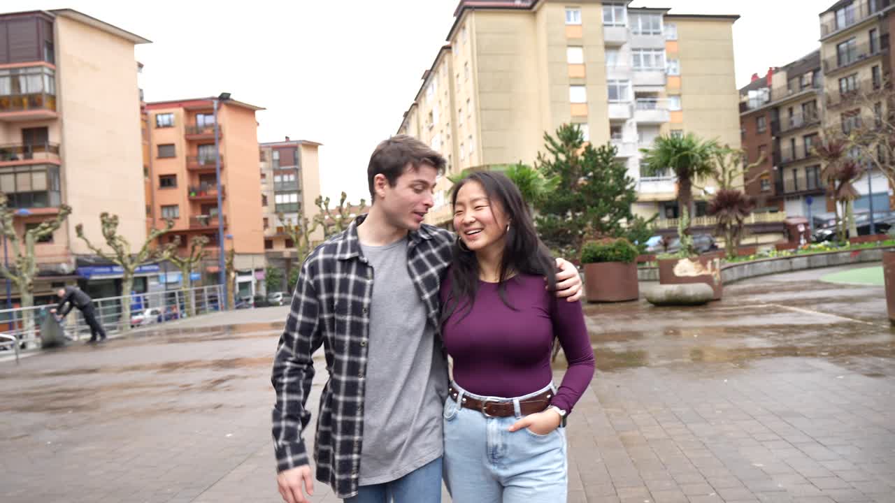 Young Couple Enjoying a Walk in the City