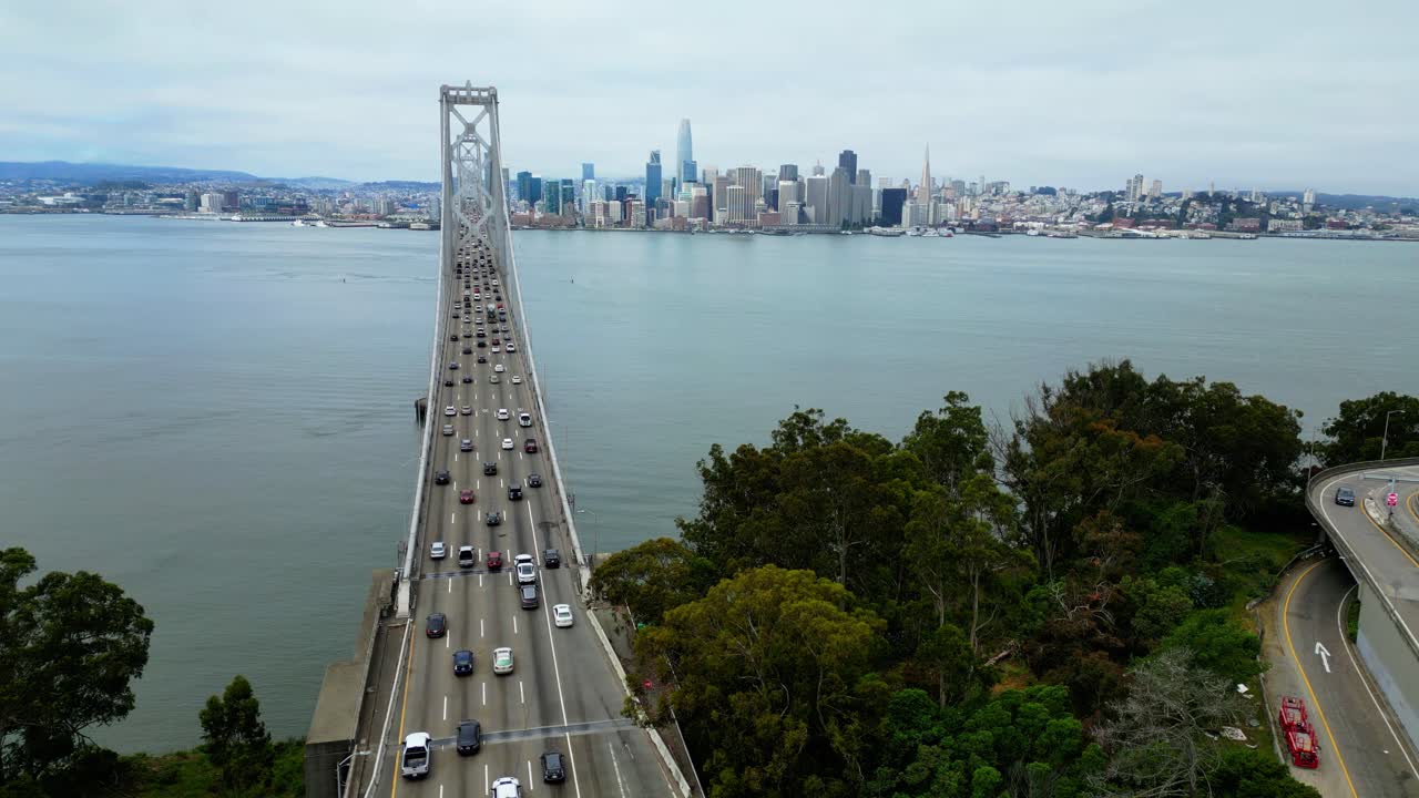 Static drone view of busy Oakland Bay Bridge with traffic (60fps)