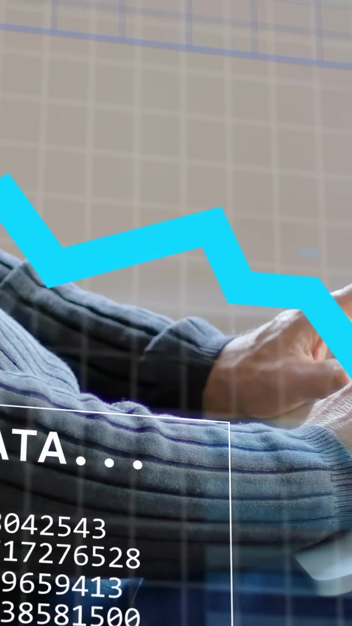 Vertical video: Male pro tapping tablet, initiating DATA panel and blue charts analyzing finance