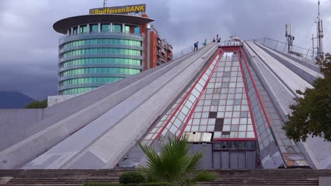 an abandoned pyramid is a vestige of a communist era in downtown tirana albania