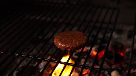 burger cooking on a grill