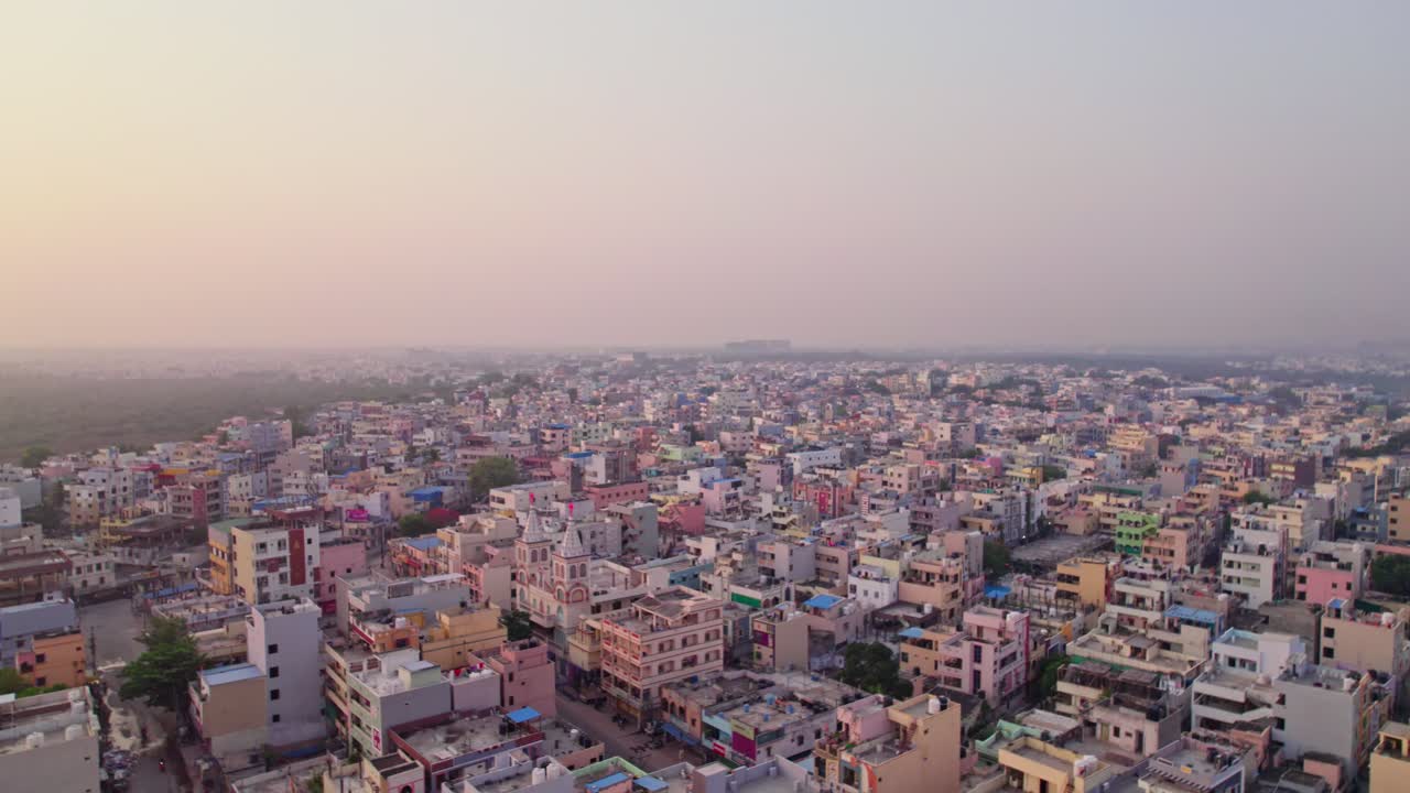 Cityscape with urban forest and fog. day time, moving down, drone shot, 4k.