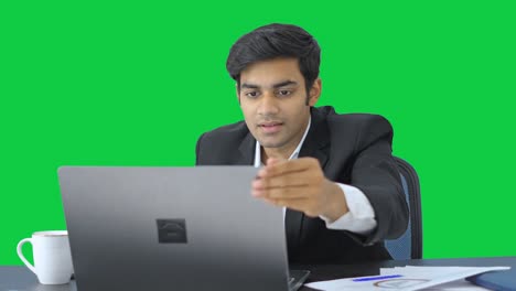 Indian-employee-finishes-the-work-and-relaxes-Green-screen