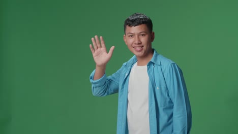 teenager waving hello