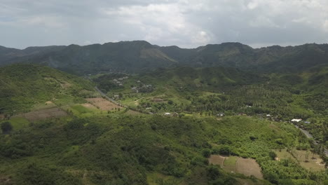 Lush-green-jungle-aerial-Misty-Lombok-mountains-under