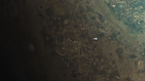 space asteroid meteor fragment heading towards planet jupiter as camera tilts up. 3d science animation prores 4k.