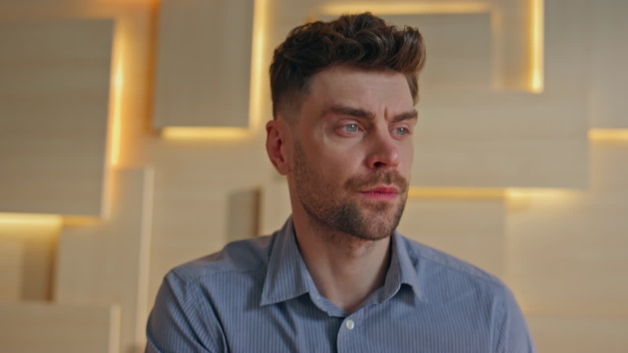 Project manager looking papers in creative office close up. Portrait businessman