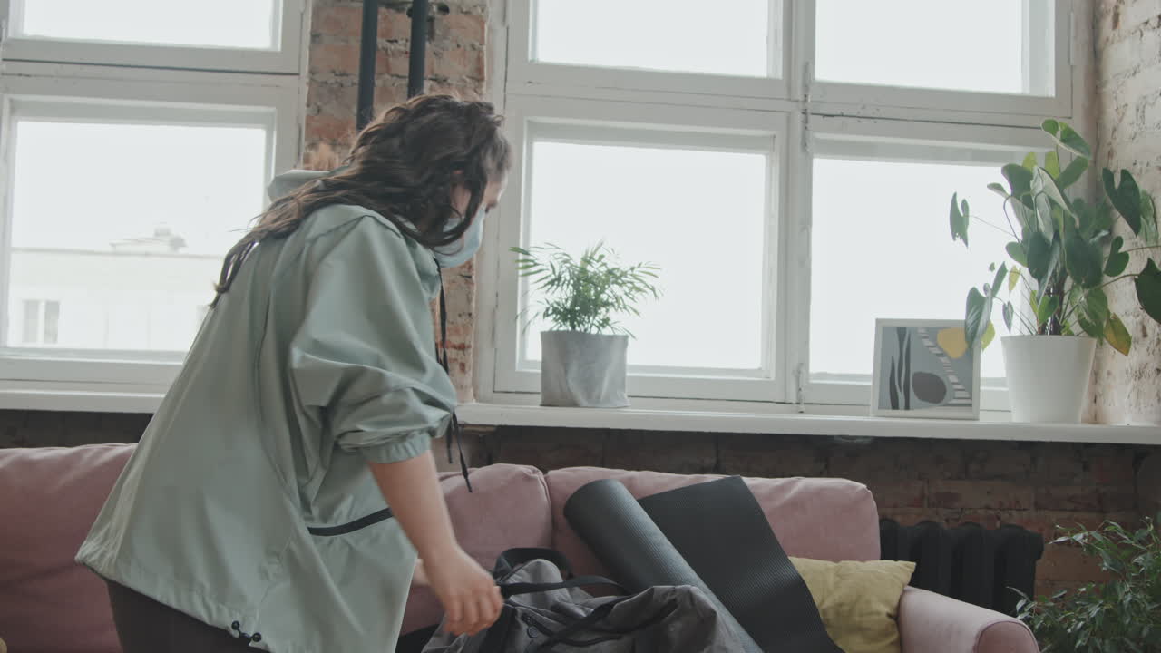 Young Woman With Down Syndrome Getting Ready For Sports Training