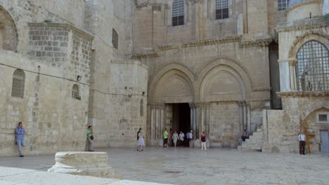 entrance to the church of the holy sepulchre jerusalem - establishing shot dolly right