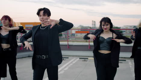 Female-dancers-dancing-in-black-outfit-on-top-of-the-building
