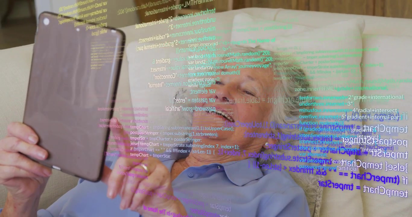 Senior woman adjusting tablet angle and swiping while scrolling code overlay for coding practice