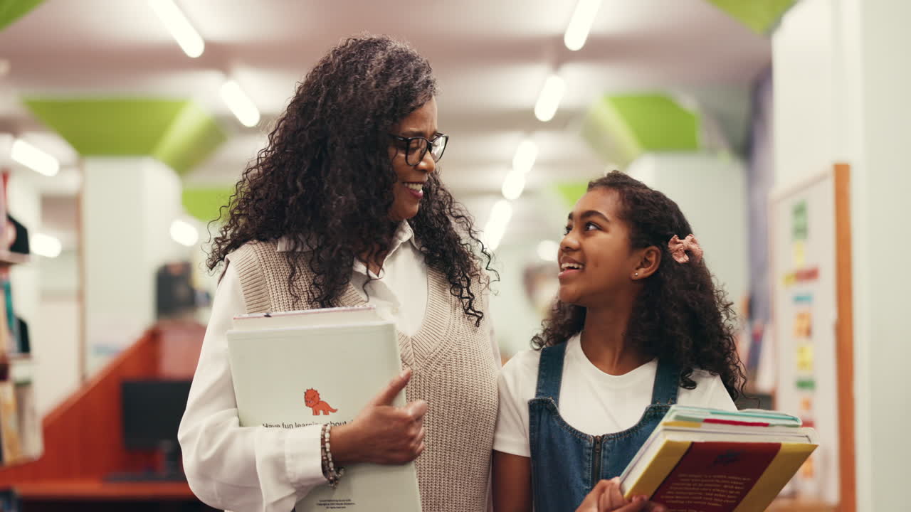 Woman and girl in a library