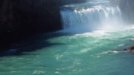 slow motion shot of the godafoss waterfall in north iceland.