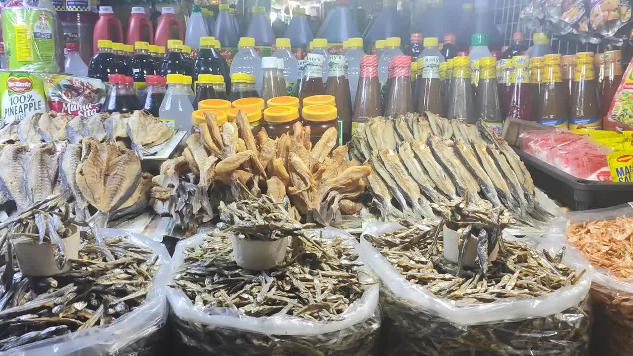 Dried fish is seafood preserved through dehydration, enhancing flavor and extending shelf life. It has a chewy texture and is often used in various cuisines, adding a savory, salty taste to dishes.