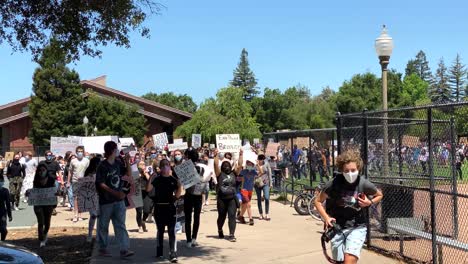 organized march in menlo park, peacefully protesting police brutality and racial inequality in the wake of the death of george floyd who was killed by a minneapolis police officer last week.