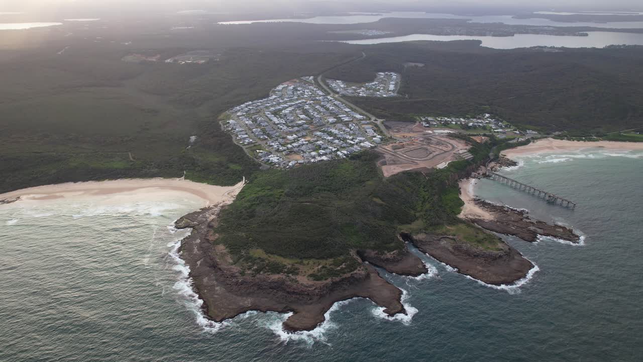 Hales Bluff And Suburb In Catherine Hill Bay, NSW, Australia - Aerial Drone Shot
