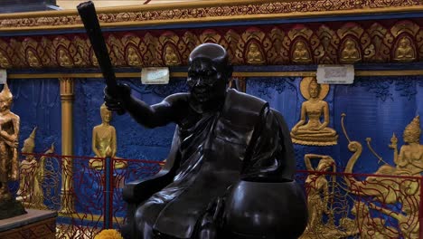 beautifully crafted statue of the buddha inside a temple